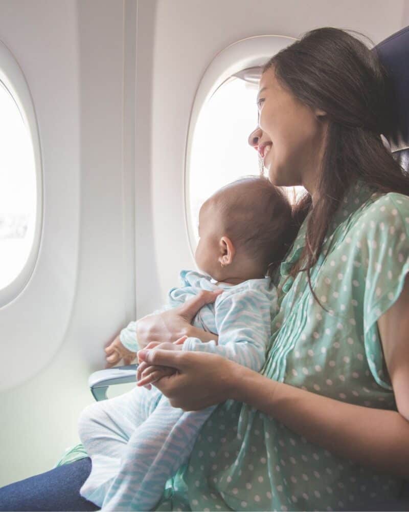 helping baby sleep on an airplane