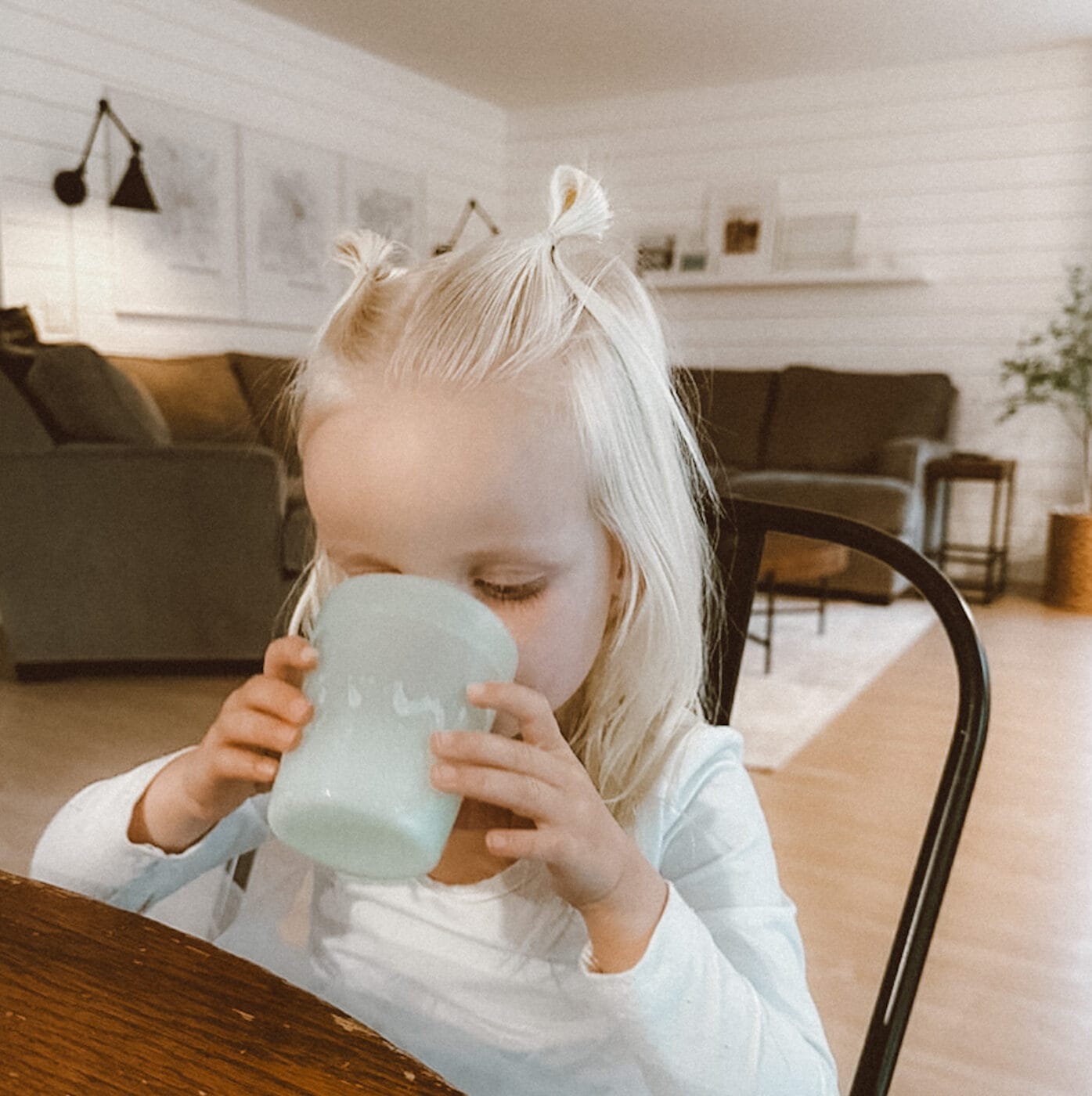 By offering cow's milk to your toddler in an open cup they will be less likely to exceed the recommended 16 ounces of milk per day, and still have room to meet their nutritional needs with food.